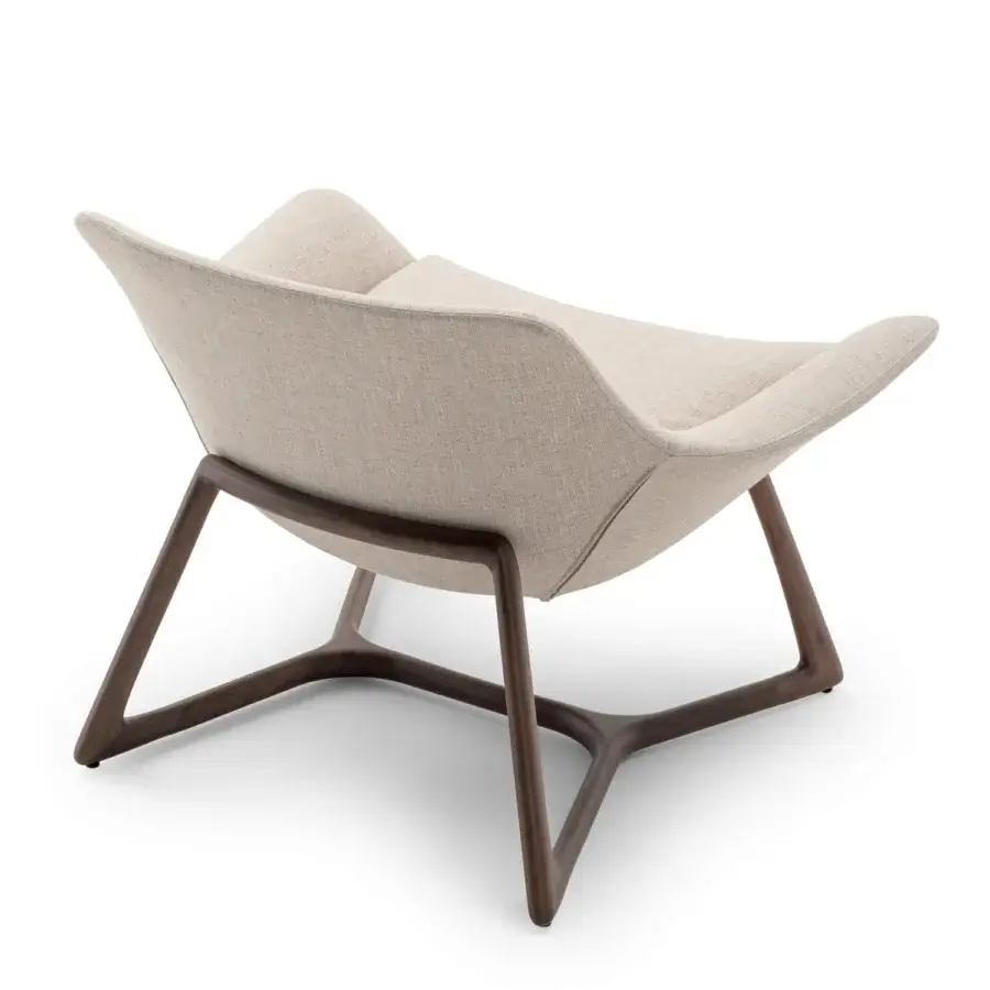 Lavish Turri Harp Lounge Chair with a light beige textile seat and smooth finished solid walnut wood base