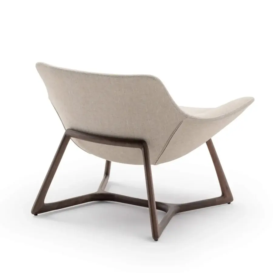 Exceptional Turri Harp Lounge Chair with organically curved textile upholstery and a smooth walnut wood base