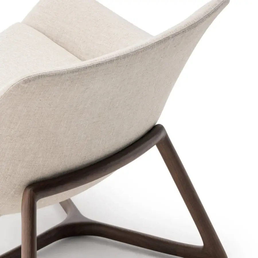 Superior Turri Harp Lounge Chair with light beige textured fabric upholstery and a smooth dark-toned walnut wood base