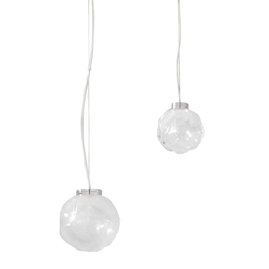 Distinguished Stillux The Light suspension lamp with rounded organic form in Certified Lead Crystal and silver-toned metal cables with transparent finish