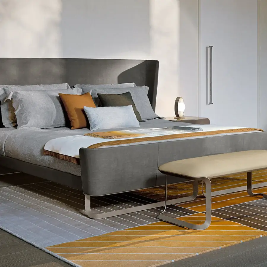 Elegant Turri Milano bench crafted with a curved brushed nickel structure and light beige textile upholstery with a smooth finish