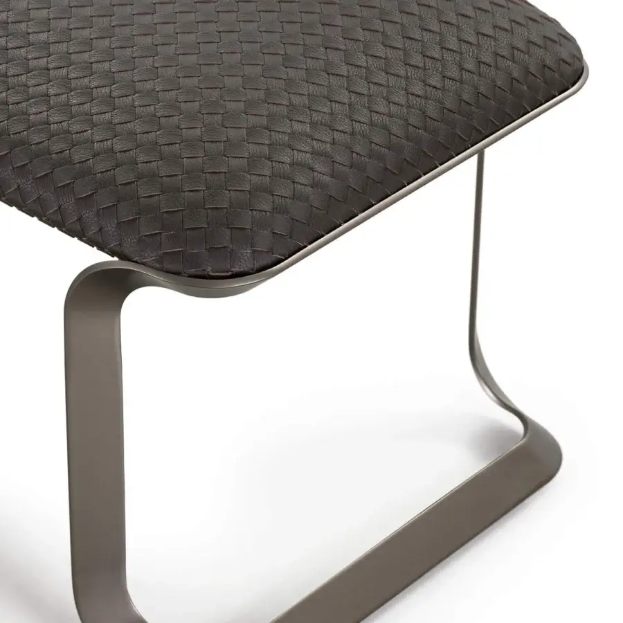 Lavish Turri Milano bench with a gracefully curved brushed nickel metal base and woven deep brown textile upholstery