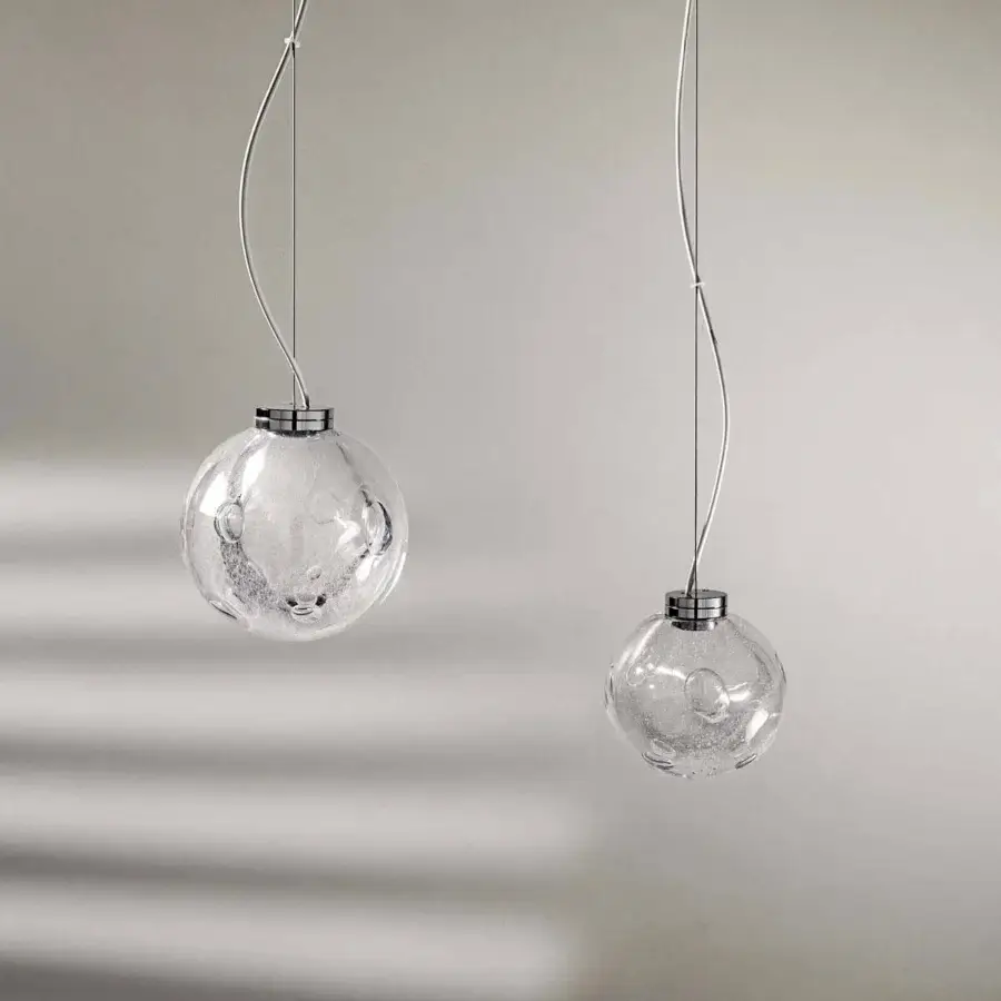 Exceptional Stillux The Light suspension lamp with a transparent Certified Lead Crystal diffuser and sleek chrome metal frame