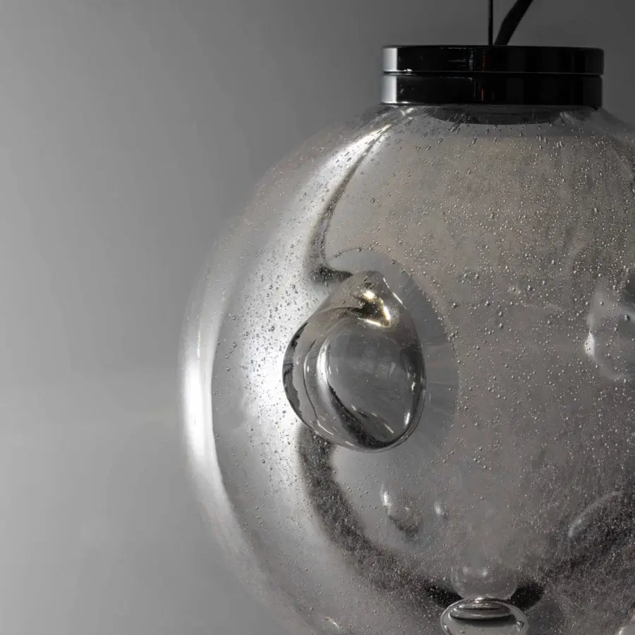 Captivating Stillux The Light suspension lamp with a transparent gray certified lead crystal sphere and chrome metal frame