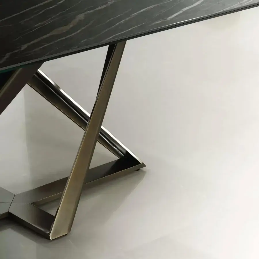 Superior Bontempi Millennium table with dark matte tabletop and intersecting bronze-like metal legs