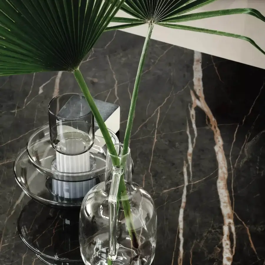Captivating Bontempi Millennium table with dark stone-like tabletop and prominent light veining in glossy finish