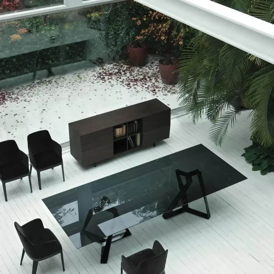 Distinguished Bontempi Millennium table with dark glossy glass top and angular dark metal trestle base