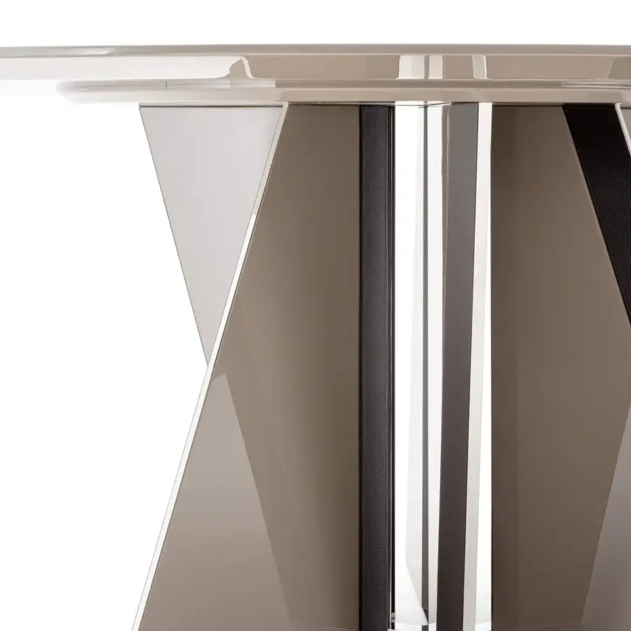 Exceptional Turri Milano table with a glossy lacquered geometric base, reflective glass top and taupe leather accents