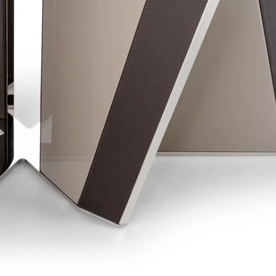 Innovative Turri Milano table with a captivating geometric base, dark brown leather applications and glossy lacquered wood