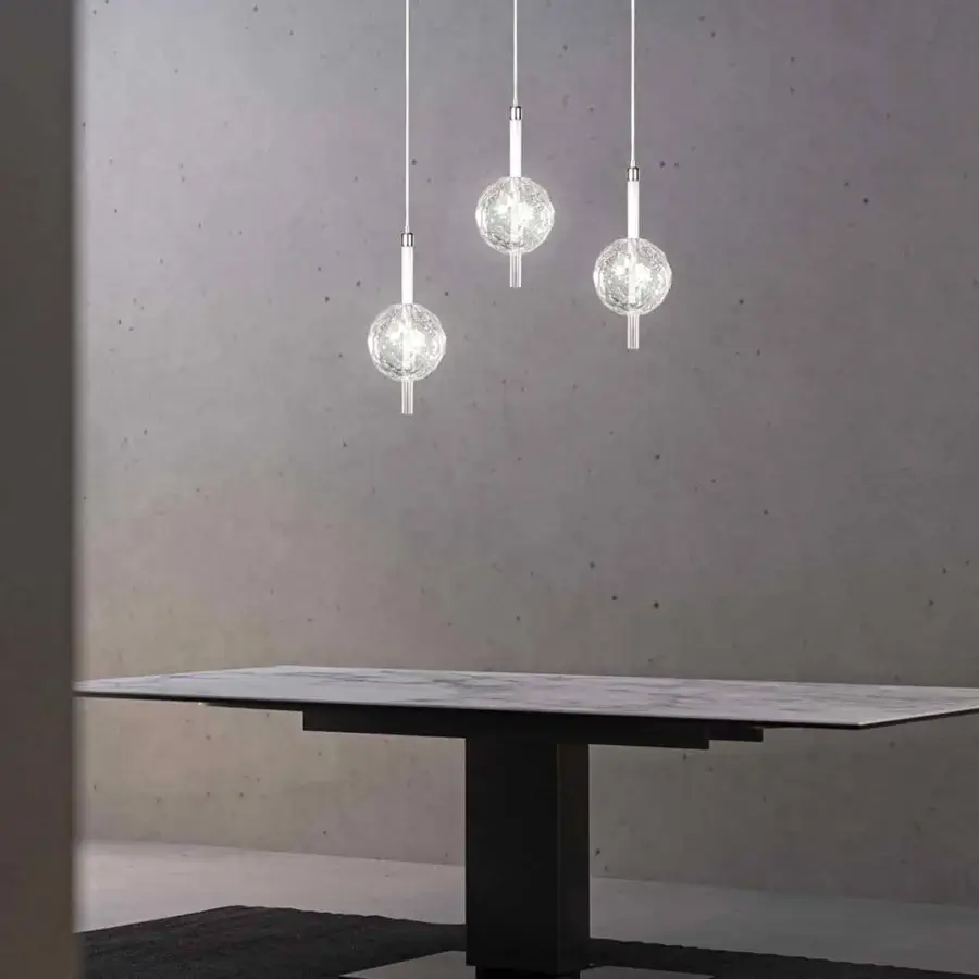 Distinguished Stillux The Light suspension lamp with a lead crystal diffuser, hand made with a raw ice effect and slender white rods