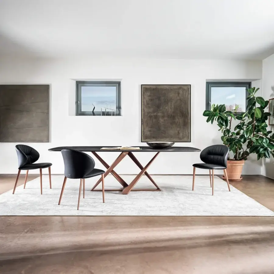 Superior Bontempi Millennium Barrel table with a boat-shaped dark-toned wood tabletop and geometric matte bronze metal base