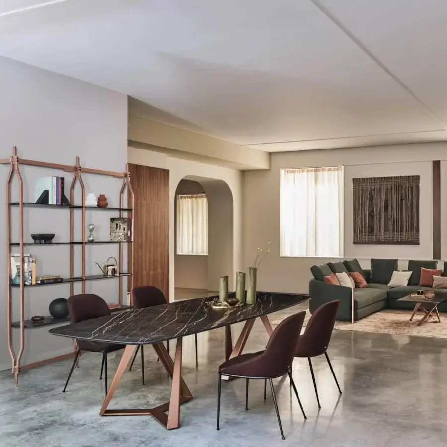 Distinctive Bontempi Millennium Barrel table with a dark marble-like tabletop and copper-toned geometric metal base
