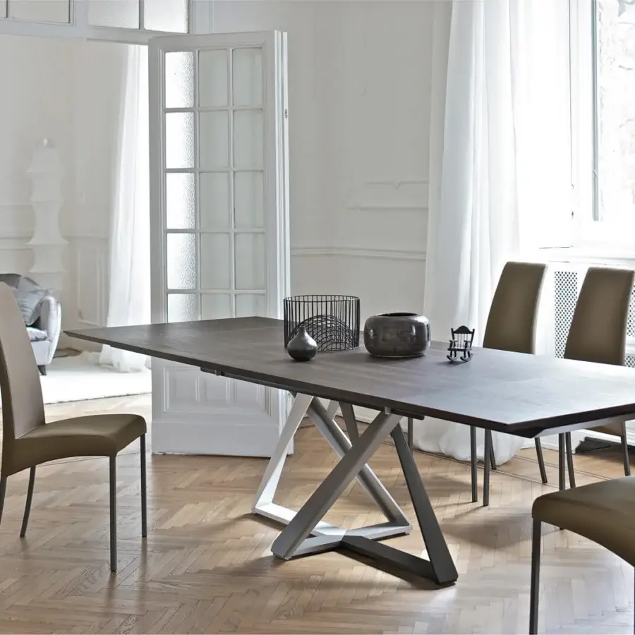 Distinguished Bontempi Millennium table crafted in Italy with a dark wood-like top and uniquely designed intersecting white and dark gray metal base
