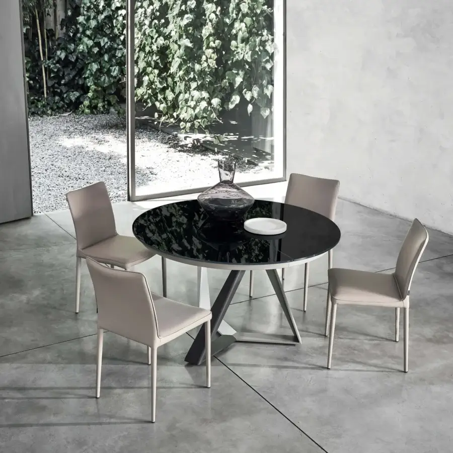 Superior Bontempi Millennium round extendable table with a glossy black tabletop and satin gray geometric metal base