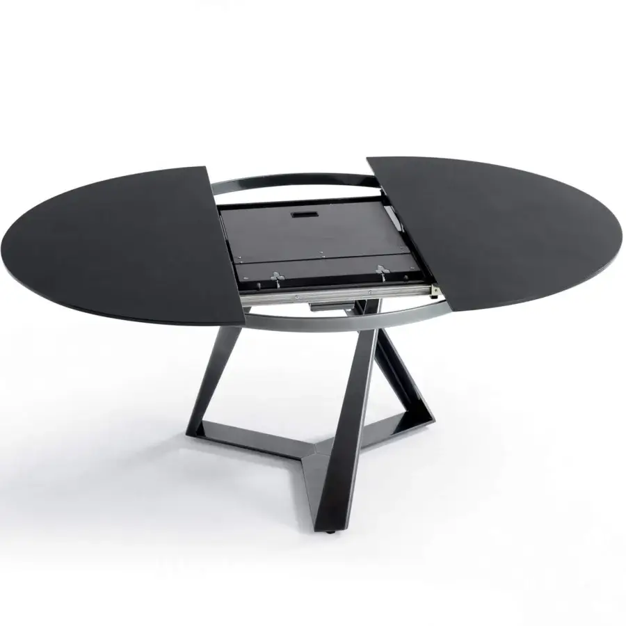 Exceptional Bontempi Millennium round extendable table built with sleek black metal legs and matte black synthetic tabletop