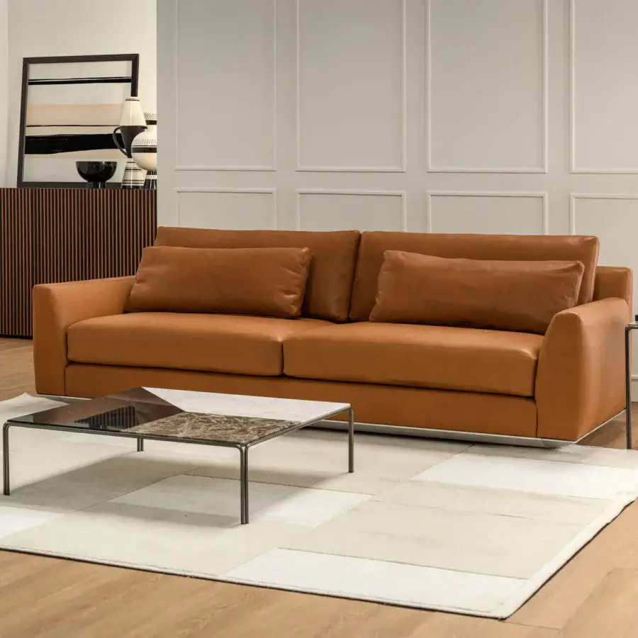 Exceptional Horm Ellington sofa crafted with supple leather in a warm tan hue and aluminum frame