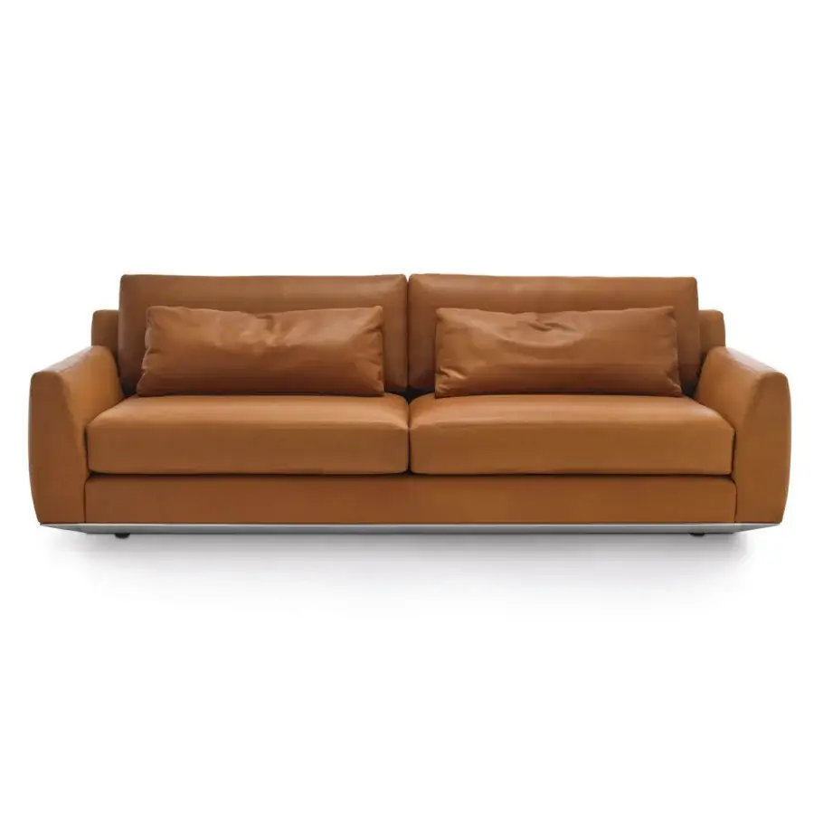 Superior Horm Ellington sofa with pillowy cushions and smooth tan leather upholstery built with an ecological aluminum frame