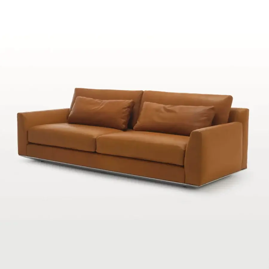 Elegant Horm Ellington sofa with removable cushions and smooth warm brown leather upholstery built with a light aluminum frame