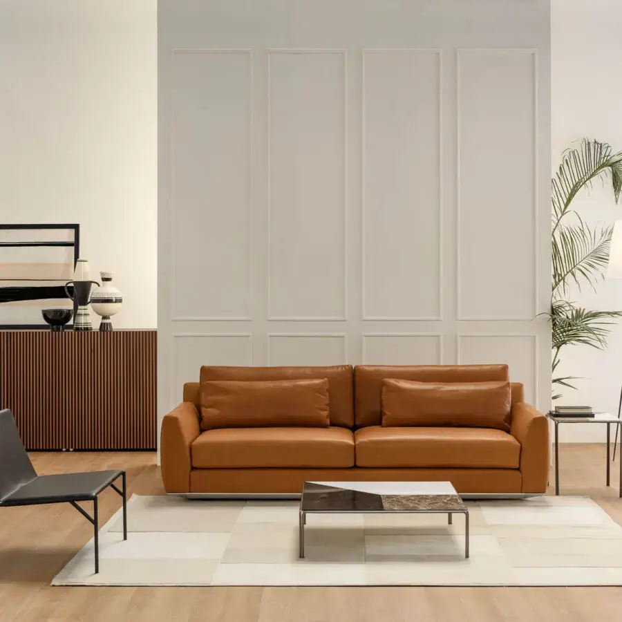 Superior Horm Ellington sofa with smooth light brown leather upholstery and a low profile aluminum frame