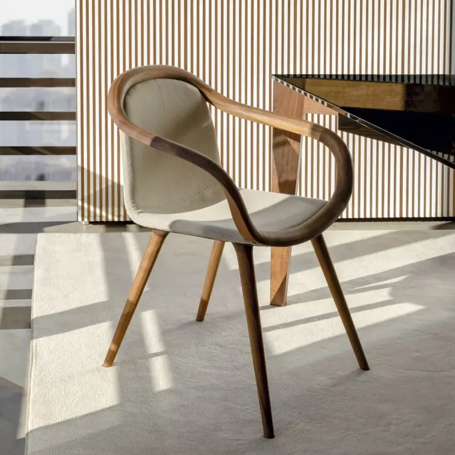 Distinguished Horm Ginevra armchair crafted with solid walnut wood and light beige premium textile upholstery