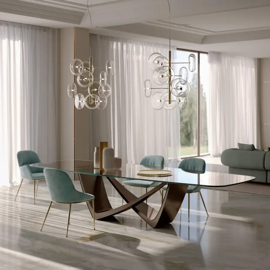 Elegant Bontempi Bach Barrel table with clear glass top and dark brown sculptural base with light gold metal legs