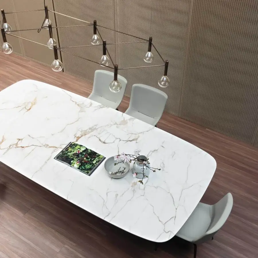Elegant Bonaldo Art table with a marble top exhibiting white, beige and brown veining and a smooth finish