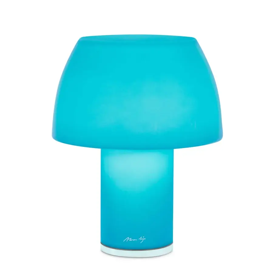 Superior Nemo Lorosae lamp in turquoise translucent glass, built with a smooth rounded silhouette and rechargeable battery power