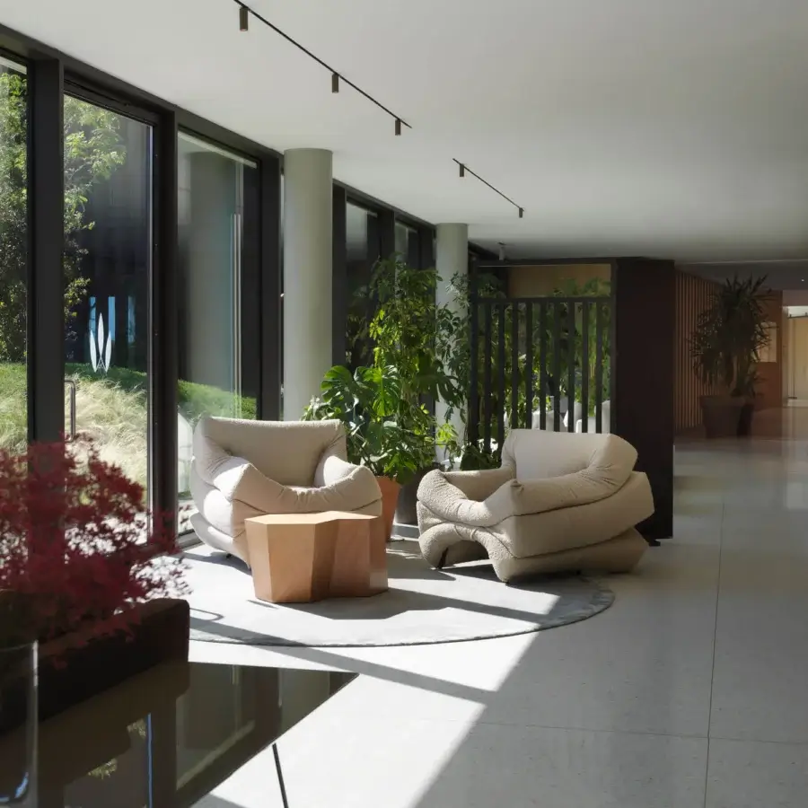 Exceptional Horm Hexagon side table and coffee table built in light okume wood with a smooth finish and interconnected planes