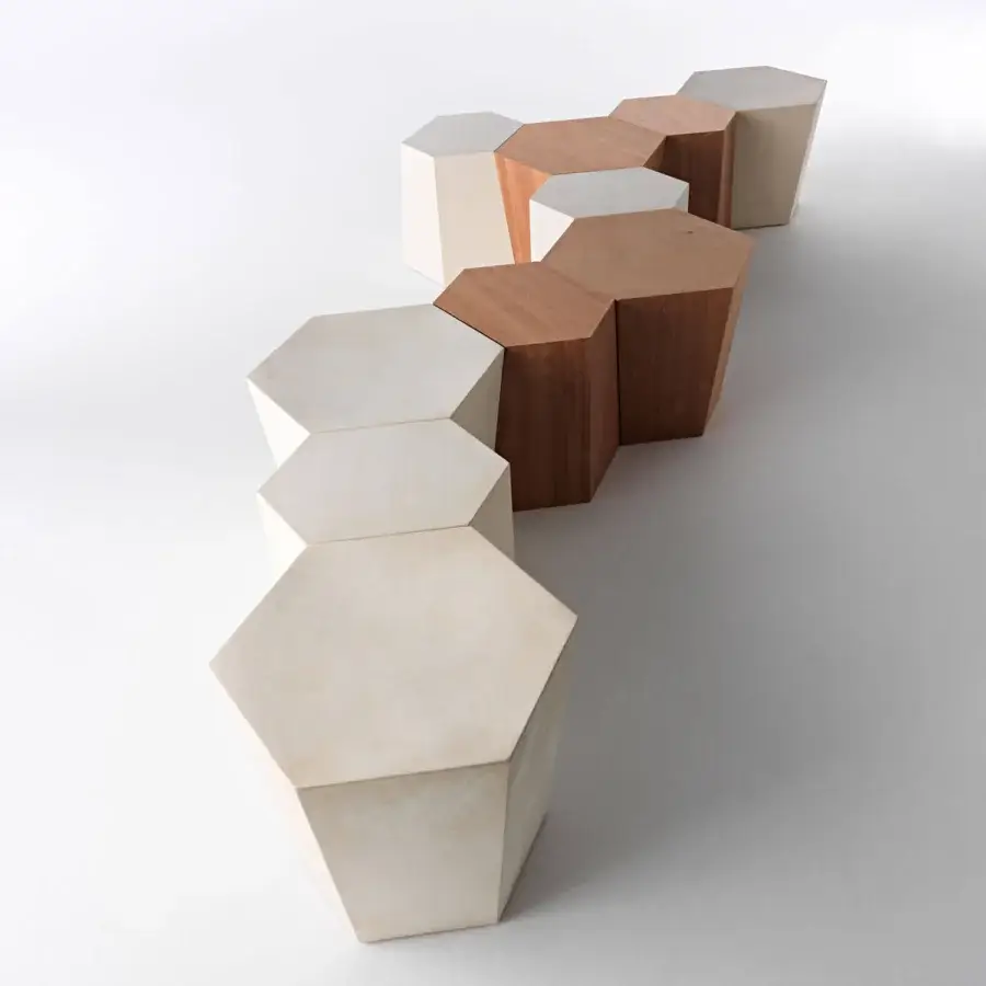Superior Horm Hexagon ottoman built with light lecce stone and reddish-brown okume wood hexagonal prisms