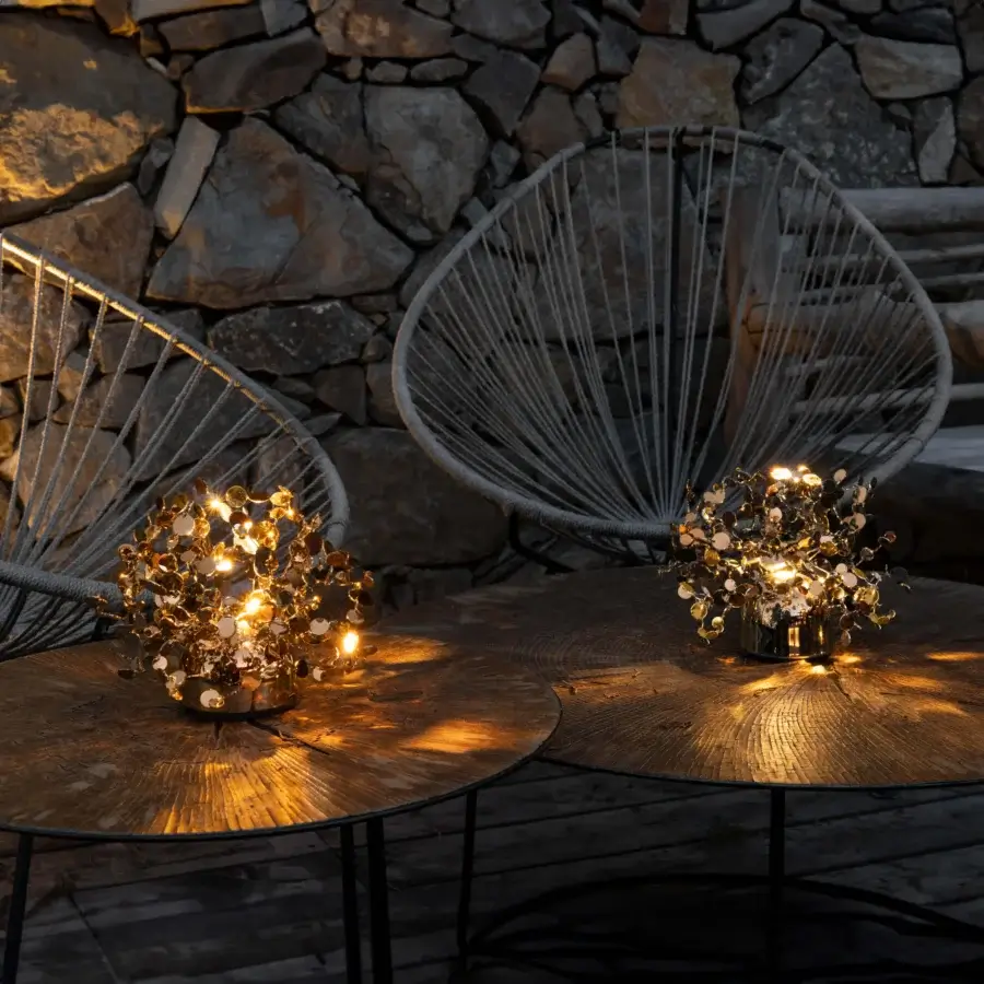 Exquisite Terzani Argent Mon Bijou lamp crafted in Italy with stainless steel and warm gold or bronze finish creating brilliant light