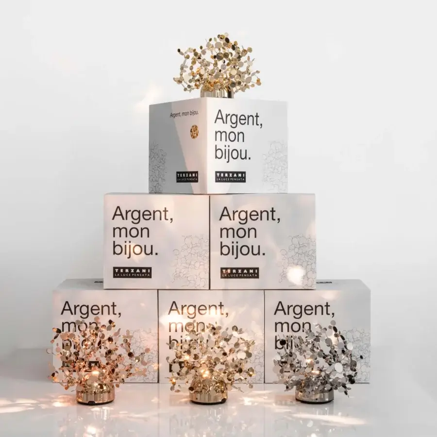 Distinguished Terzani Argent Mon Bijou lamp crafted in Italy with reflective silver-colored stainless steel discs emitting brilliant light