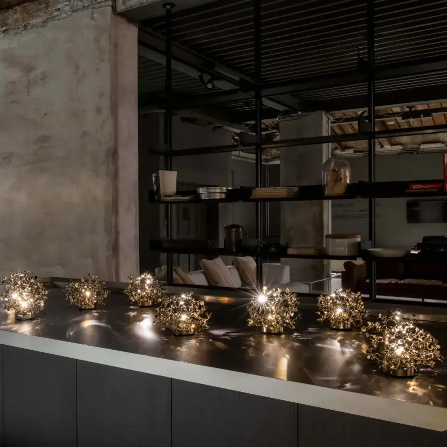Exquisite Terzani Argent Mon Bijou lamp crafted in Italy with gold-toned stainless steel and reflective discs casting ethereal light