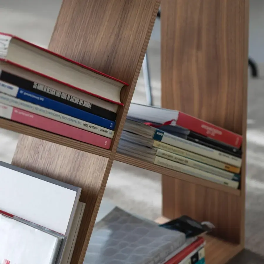 Elegant Horm J-Table desk with white laminate veneered MDF and medium-toned solid wood, showcasing a bookcase leg and subtle grain