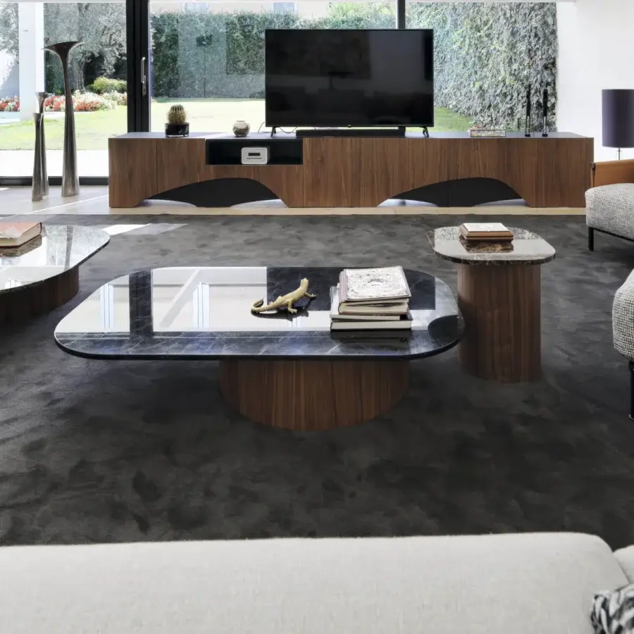 Distinguished Horm Marina coffee table with rounded rectangular dark marble top and cylindrical walnut base showcasing a smooth finish