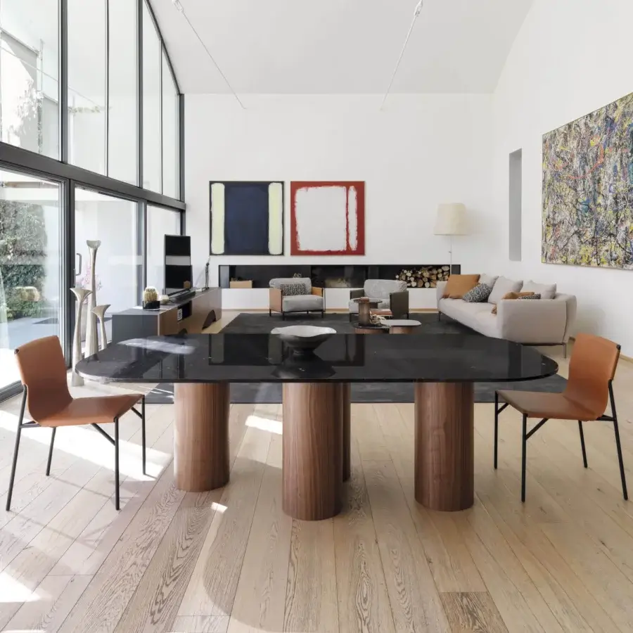 Exceptional Horm Marina table built with glossy black marble and cylindrical walnut legs inspired by Venetian art