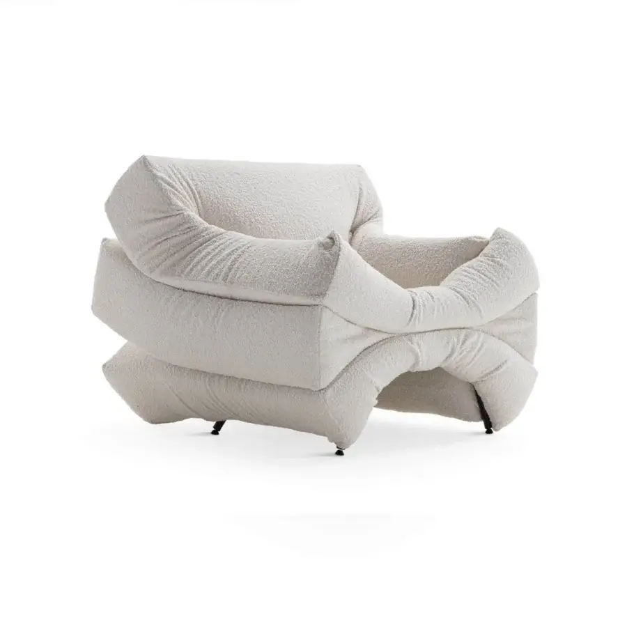 Innovative Horm Mass Pressure lounge chair with creamy off-white boucle upholstery and tubular metal structure crafted in Italy