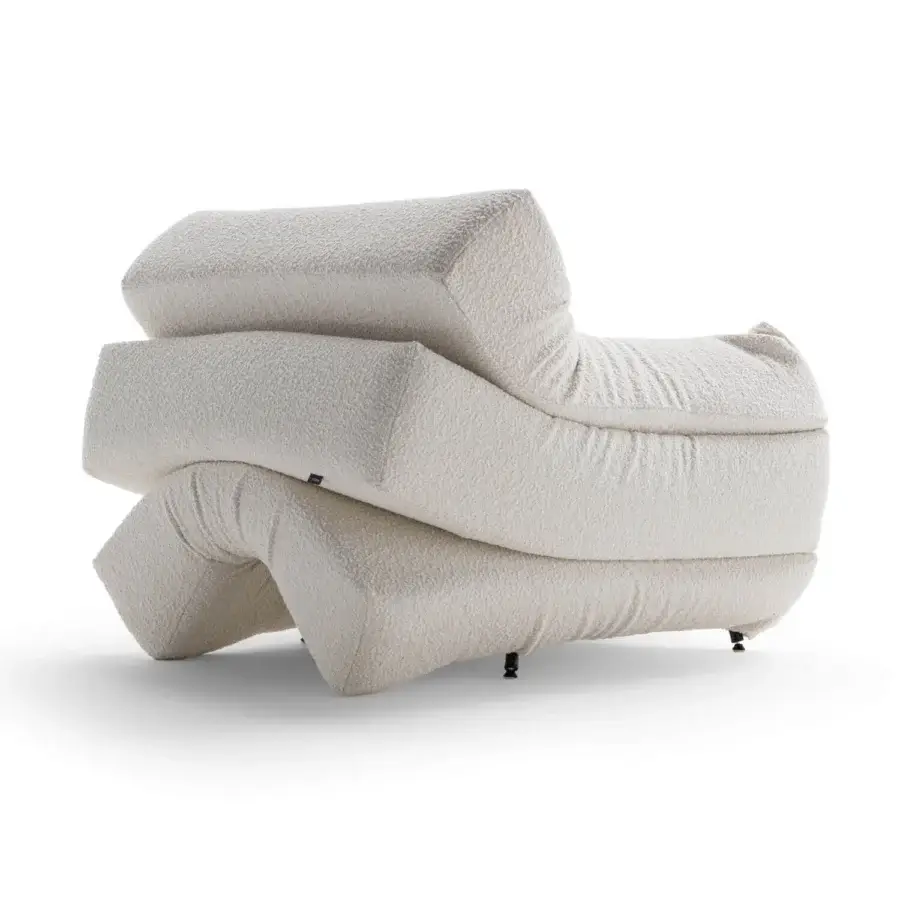 Distinguished Horm Mass Pressure lounge chair crafted in Italy with soft cream boucle fabric and curved foam elements