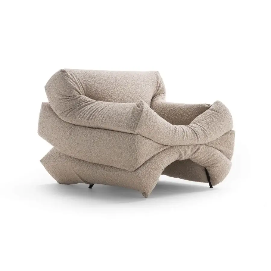 Exclusive Horm Mass Pressure lounge chair with beige boucle upholstery and tubular metal structure