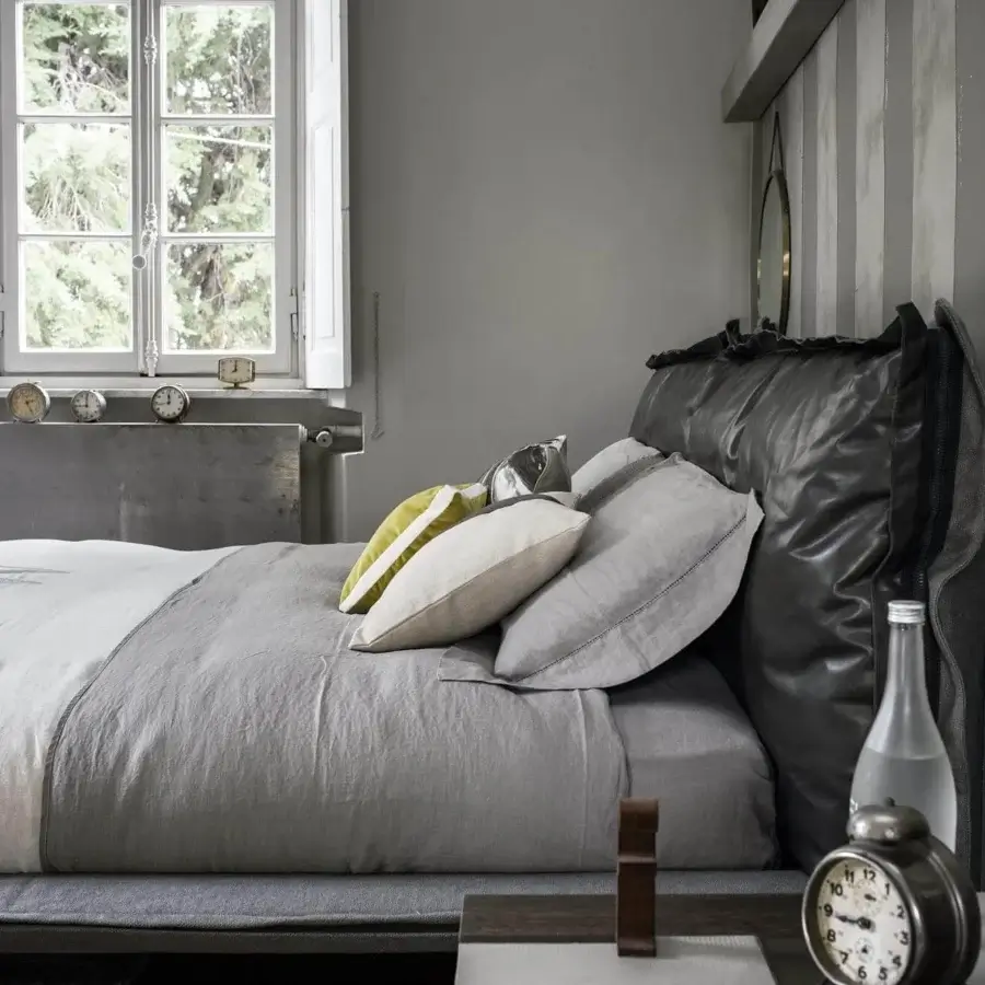 Lavish Arketipo Auto-Reverse Dream bed with dark gray upholstery, ruffled edges and zipper detailing crafted with a discreet frame