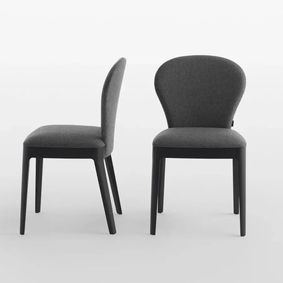 Distinguished Horm Milady chair with soft sinuous lines upholstered in premium gray textile with a matte wood base