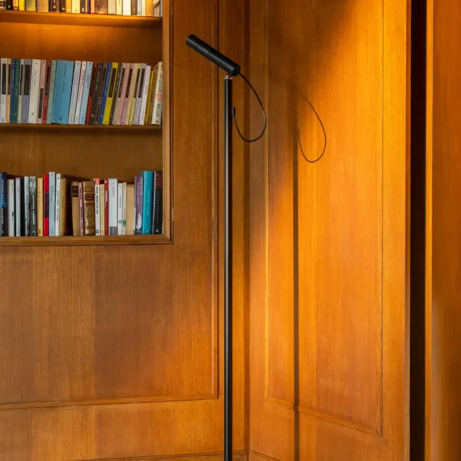 Innovative Nemo Lighting floor lamp with a matte black metal form and magnetic spherical joint for light adjustments