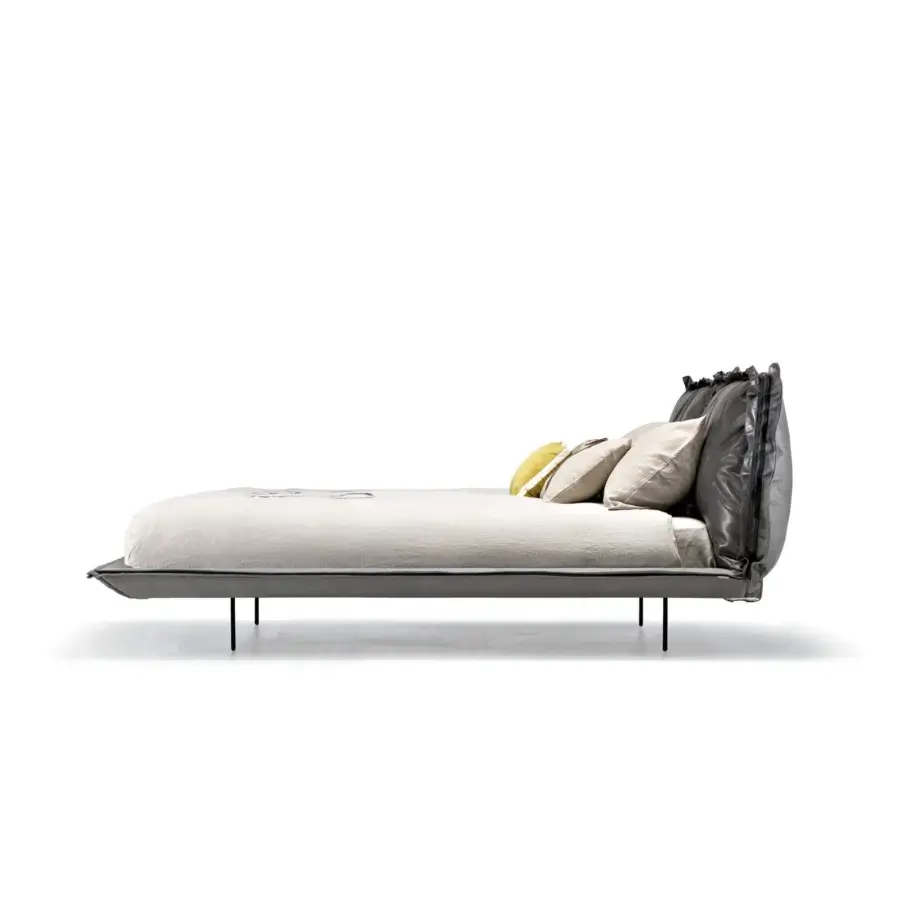 Distinguished Arketipo Auto-Reverse Dream bed with light beige linen and dark gray headboard crafted with sleek matte metal legs