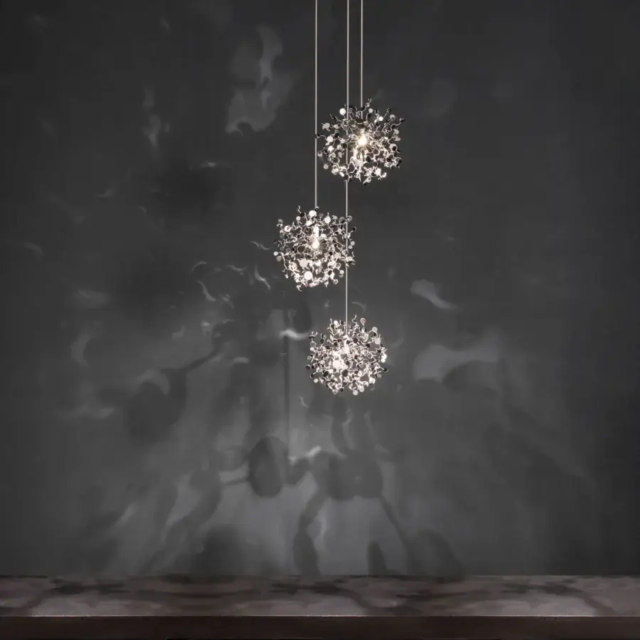 Superior Terzani Argent Mon Bijou suspension lamp crafted in stainless steel with a glossy finish radiates light