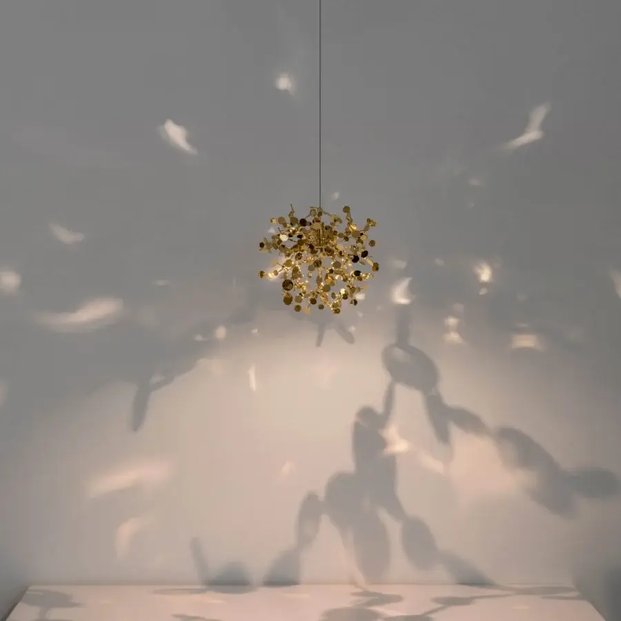 Distinguished Terzani Argent Mon Bijou suspension lamp handcrafted in stainless steel casting brilliant light with warm reflective surfaces