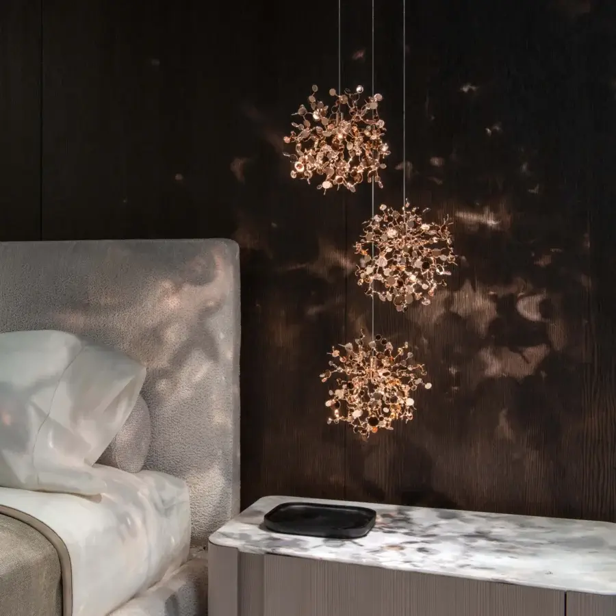 Distinguished Terzani Argent Mon Bijou suspension lamp crafted in stainless steel with a warm metallic gold finish and reflective discs