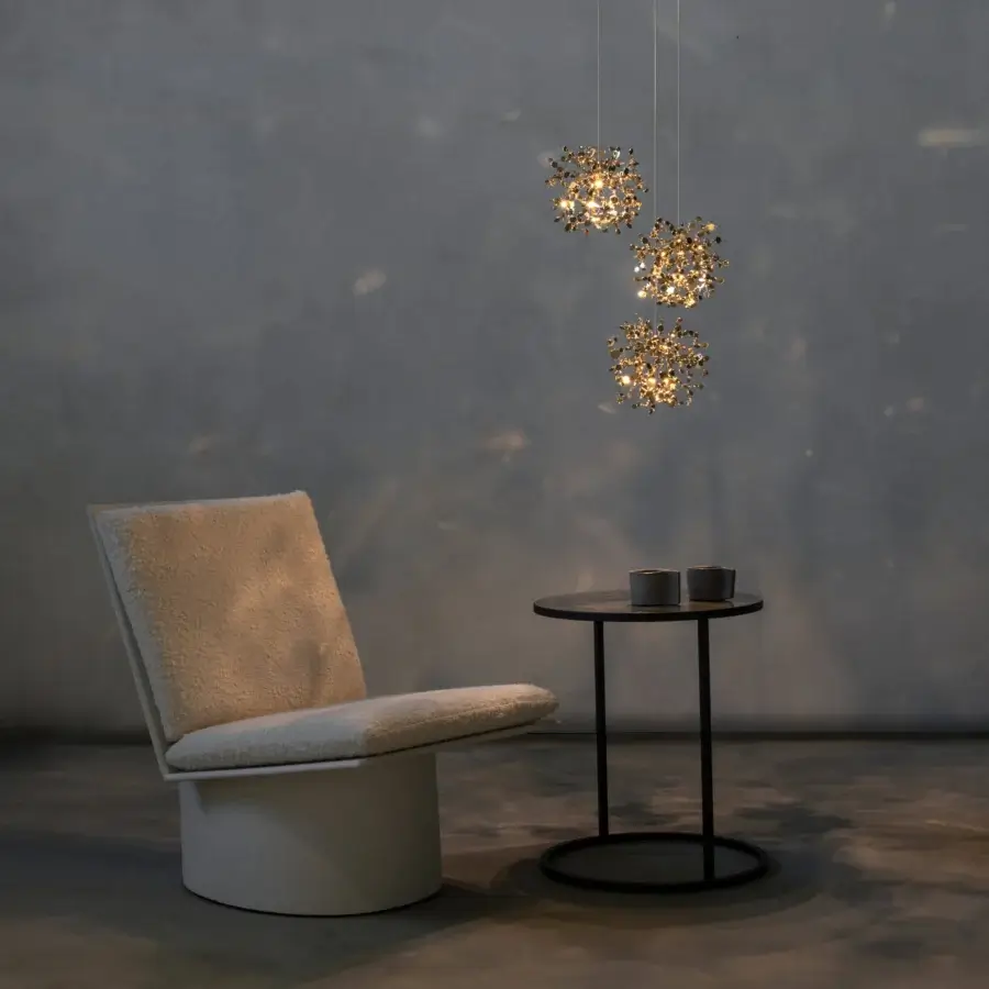 Lavish Terzani Argent Mon Bijou suspension lamp crafted in stainless steel with a warm gold finish creating brilliant light