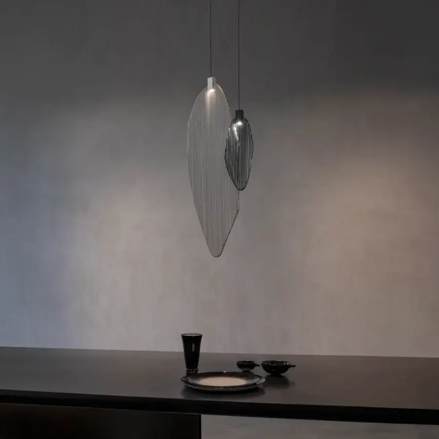 Elegant Terzani Harpe suspension lamp crafted in metal with light silver and black finish, exhibiting leaf-like forms suspended by delicate cables