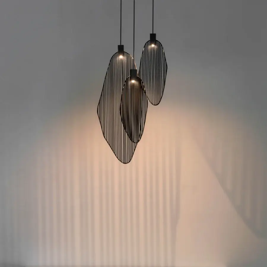 Elegant Terzani Harpe suspension lamp crafted in metal with a matte black finish and dynamic proportions