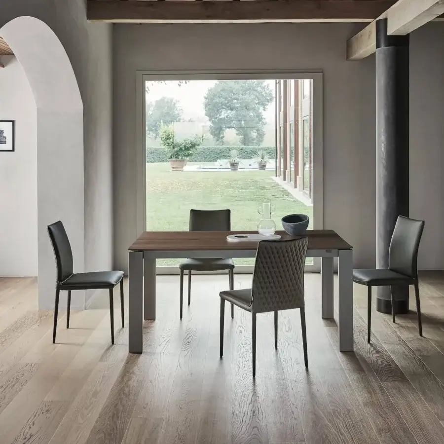 Elegant Bontempi Nata chair with dark gray textile upholstery and quilted backrest in a matte metal frame
