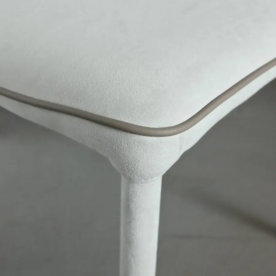 Distinguished Bontempi Nata chair crafted in Italy with neutral textile upholstery and subtle taupe accenting a matte finish